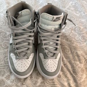Women’s Nike High Dunk in light smoke grey color.